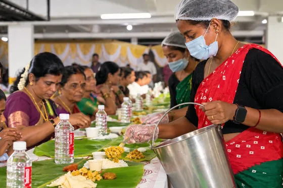 Guests dining while service team attends tables.